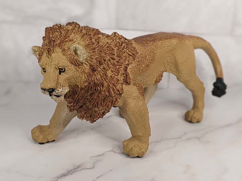 The Vanishing Wild Male Lion Figurine