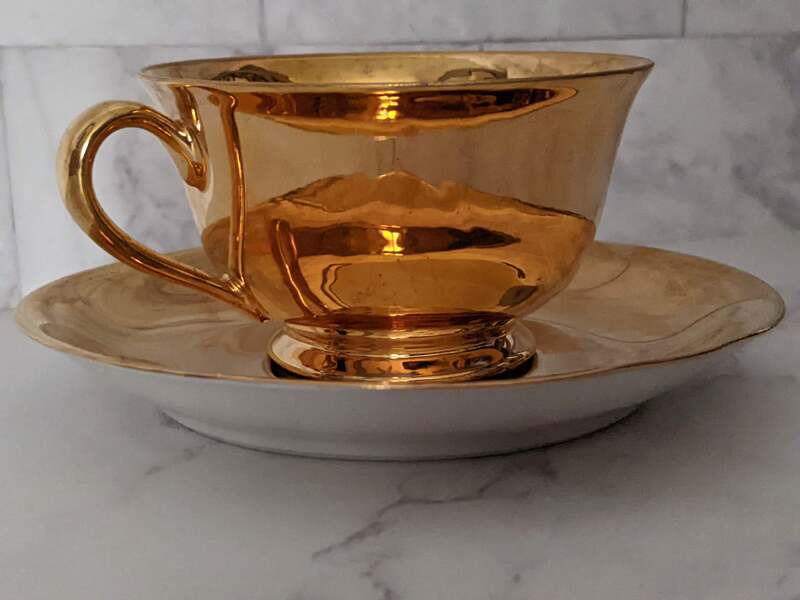 22 Carat Gold Cup and Saucer